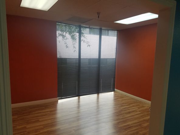 PRIVATE OFFICE AND LARGE OPEN AREA, SEVERAL USES.